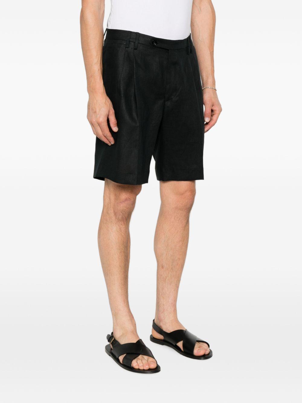 Shorts neri con pieghe 
