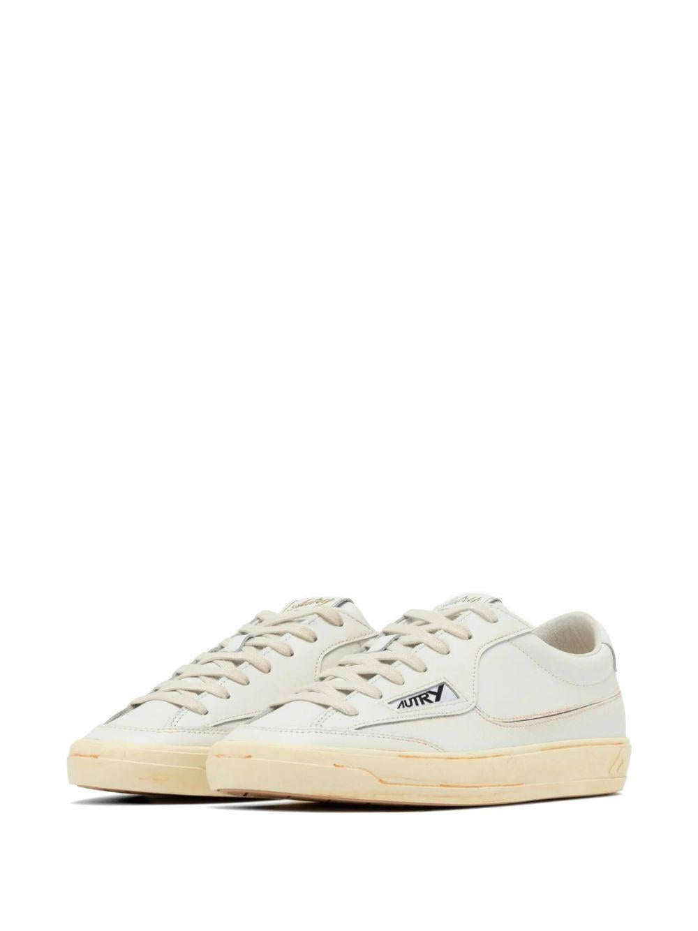 Sneakers bianche in pelle 
