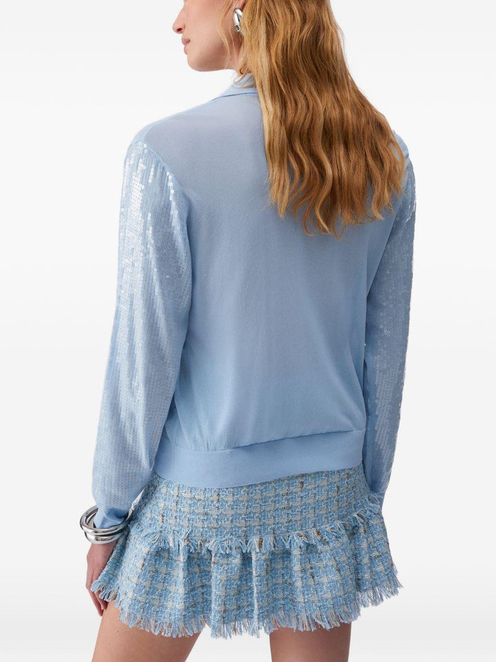 Polo con paillettes 
