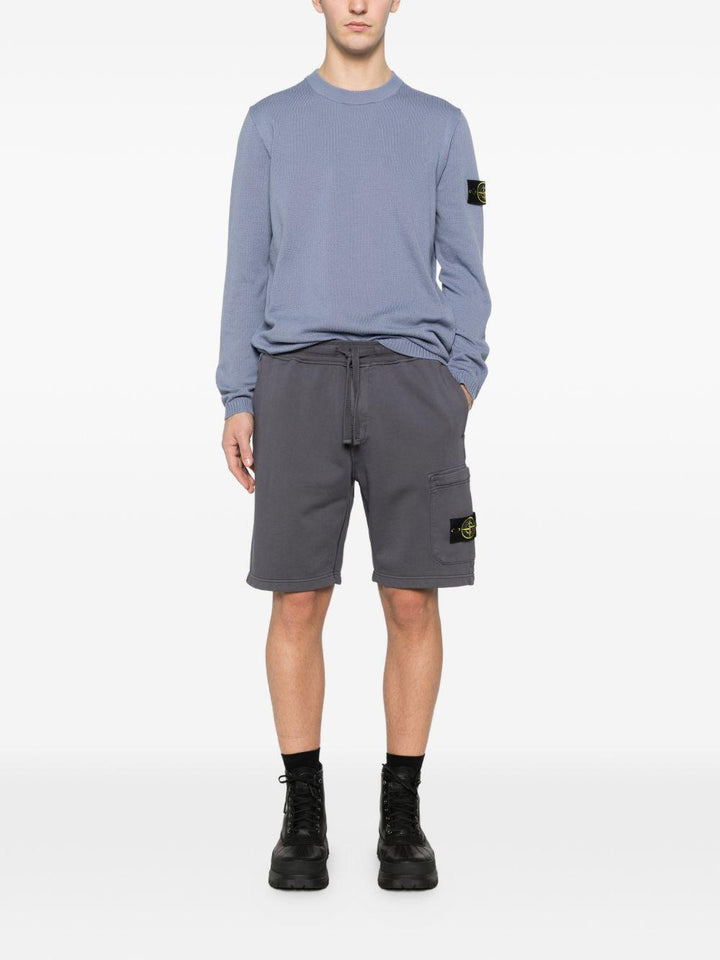 Shorts blu navy con applicazione 