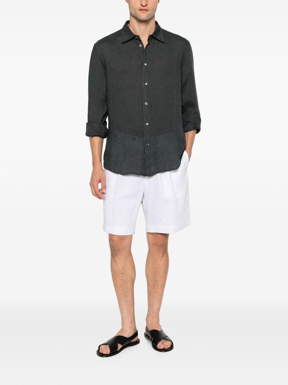 Shorts bianco con pieghe 