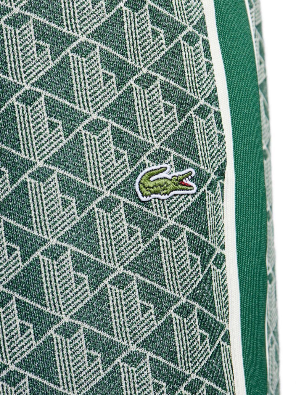Pantaloni verdi con monogramma 