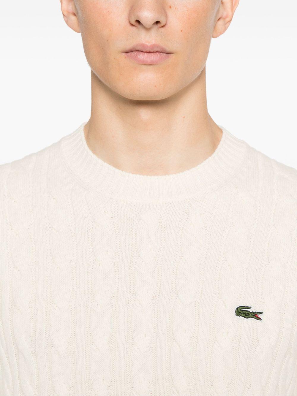Maglione bianca a maglia intrecciata 