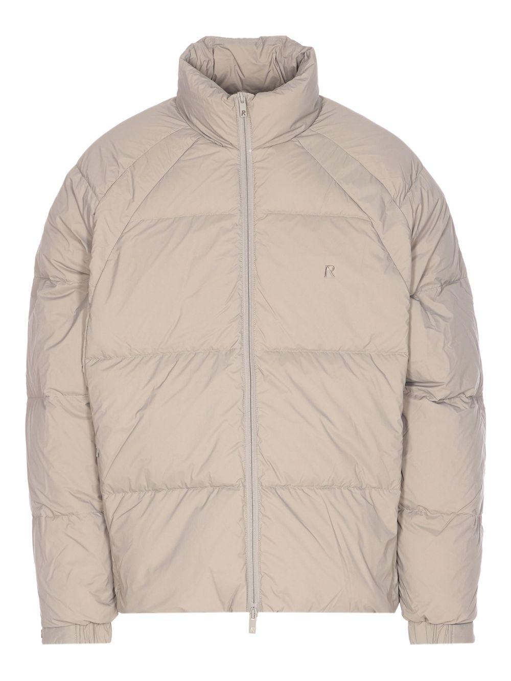 Piumino con collo a imbuto beige 