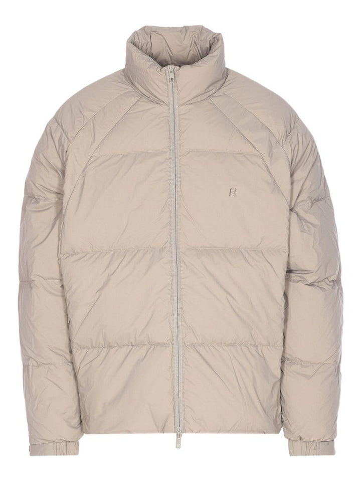 Piumino con collo a imbuto beige 