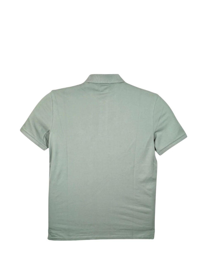 Polo verde con patch logo 
