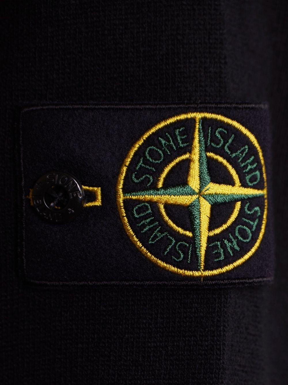 Maglione nero girocollo con dettaglio a coste 