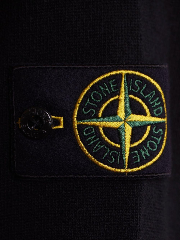 Maglione nero girocollo con dettaglio a coste 