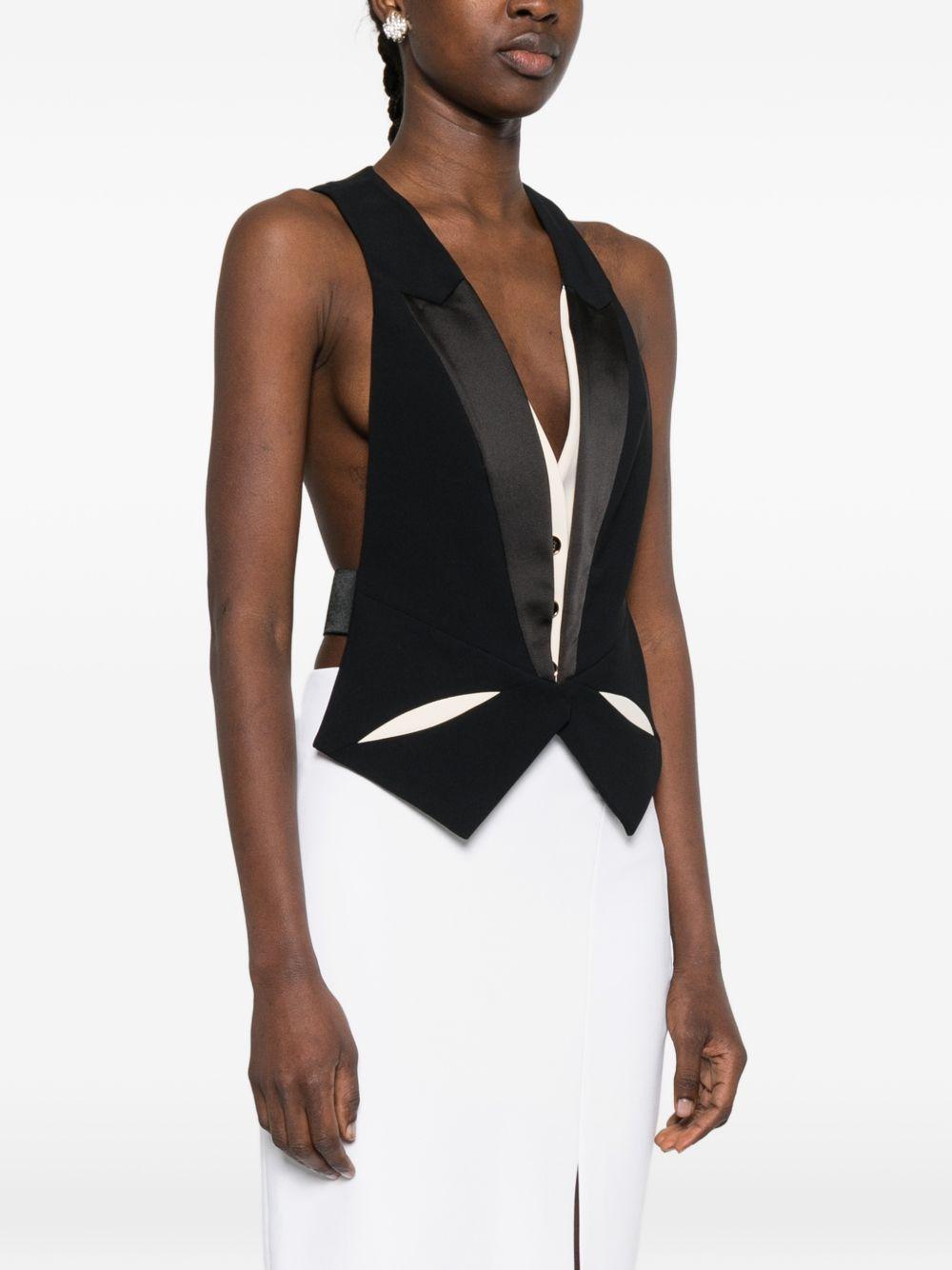 Gilet con intagli 