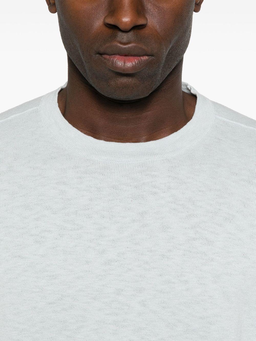 Maglione sky con applicazione 