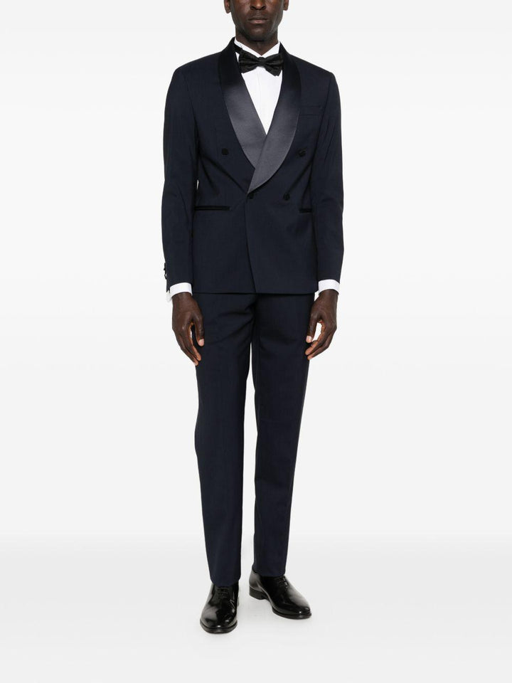 Smoking blu navy doppiopetto con rever sciallato 