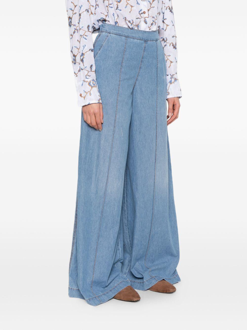 Pantaloni con stampa denim 
