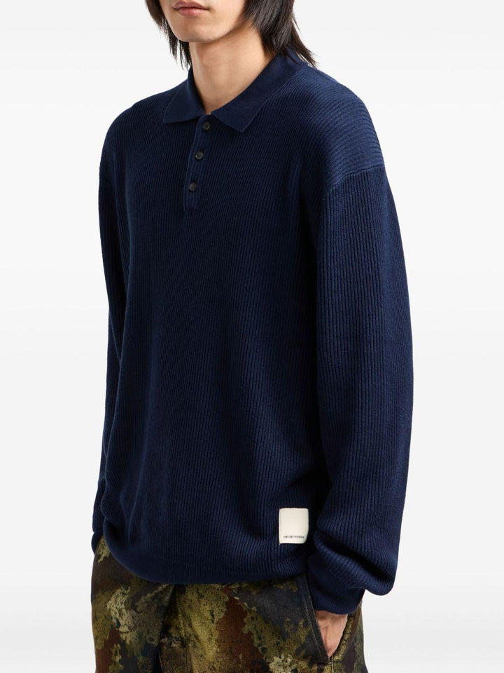 Polo blu con applicazione logo 