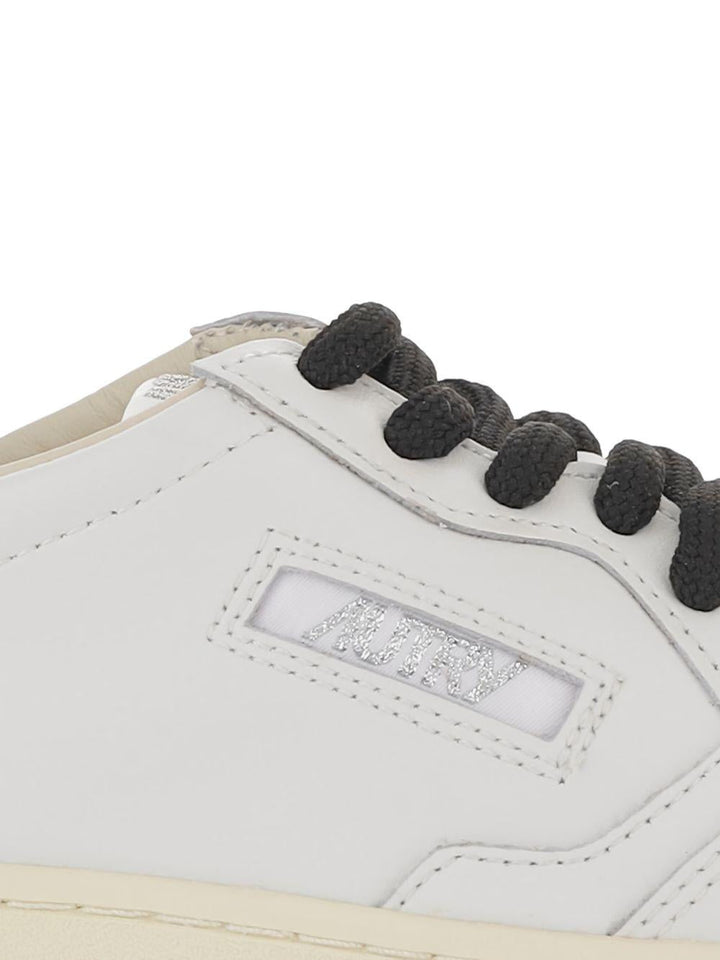 Sneakers con dettaglio leopardato 