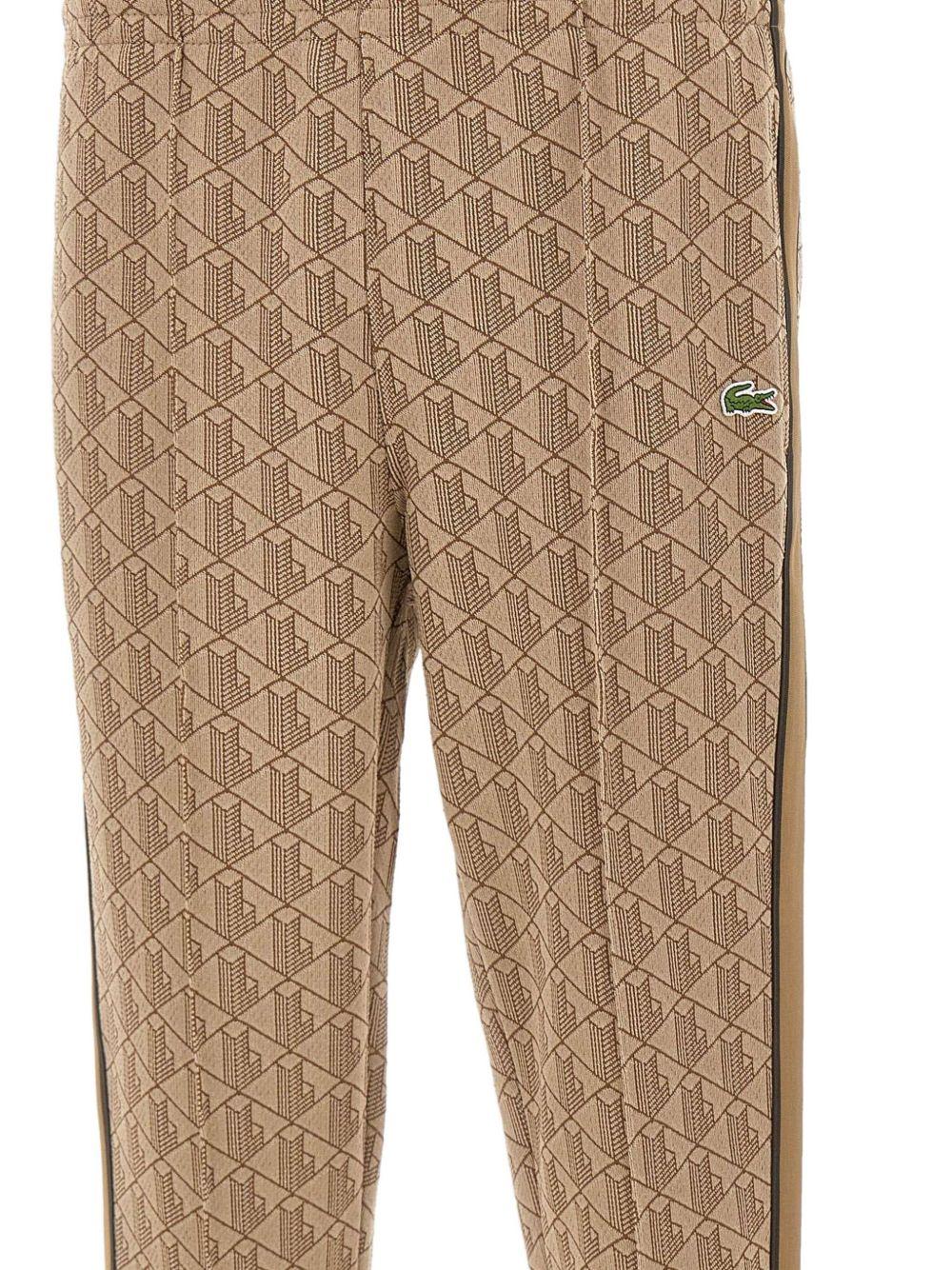 Pantaloni marroni con monogramma 