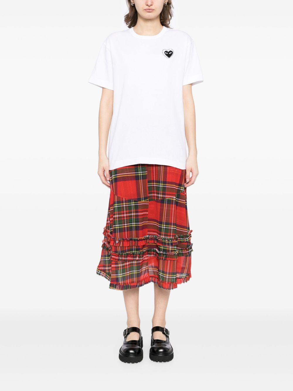T-shirt bianca con applicazione logo e cristalli 