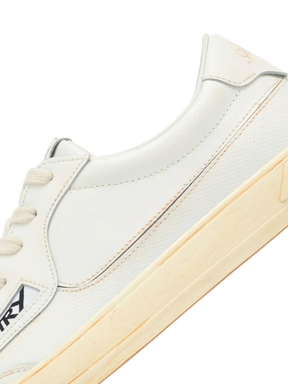 Sneakers bianche in pelle 