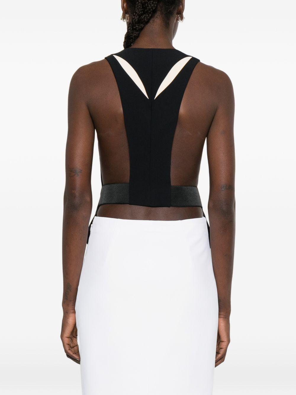 Gilet con intagli 