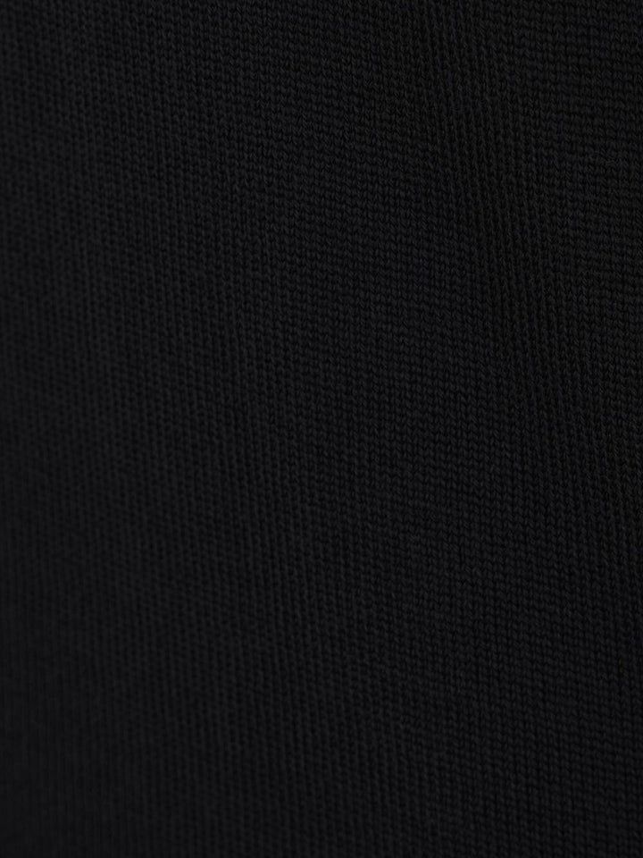 Maglione nero a collo alto in lana merino 