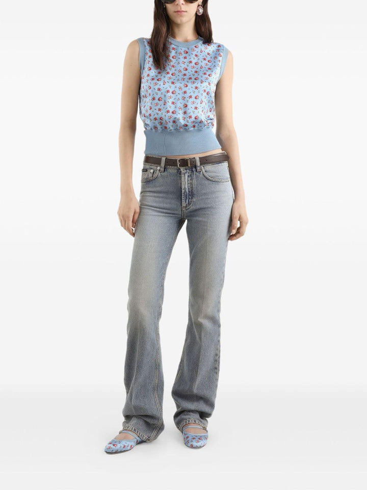 Jeans con placca logo 