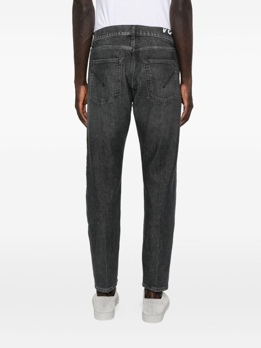 Jeans grigio con baffatura 