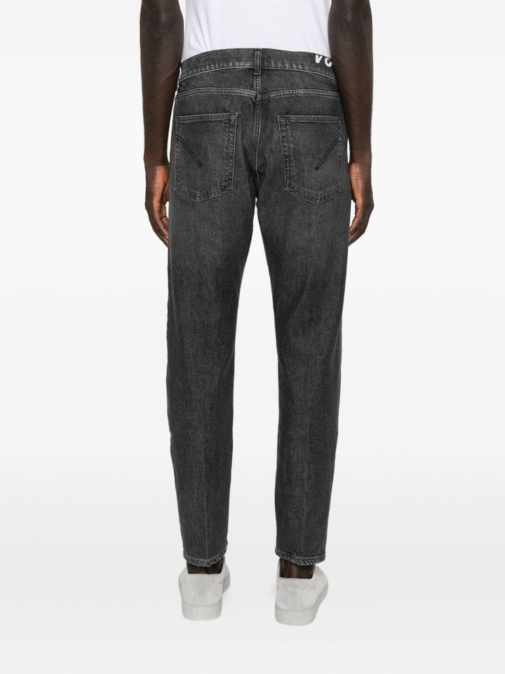Jeans grigio con baffatura 