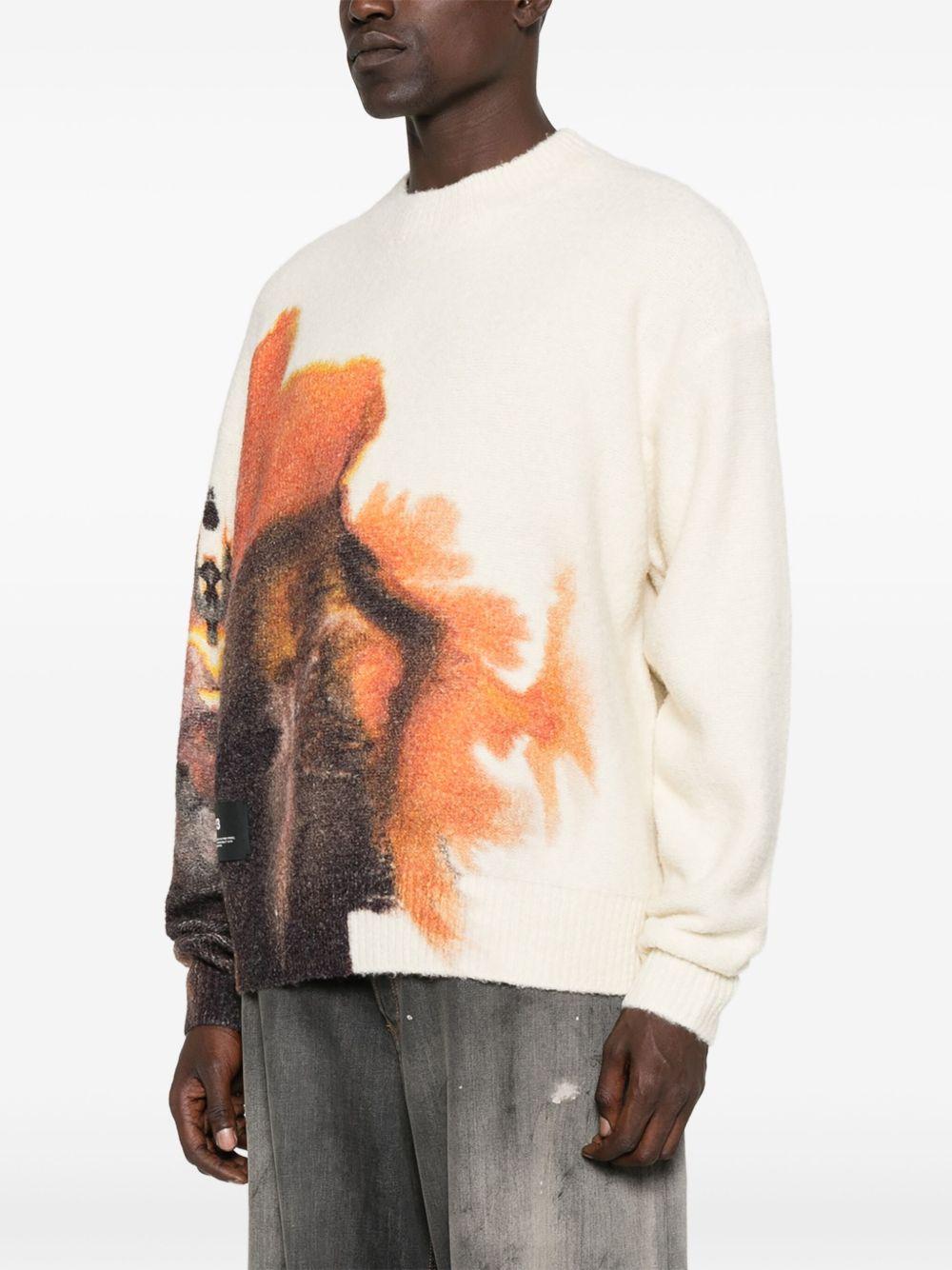 Maglione bianco con stampa grafica 