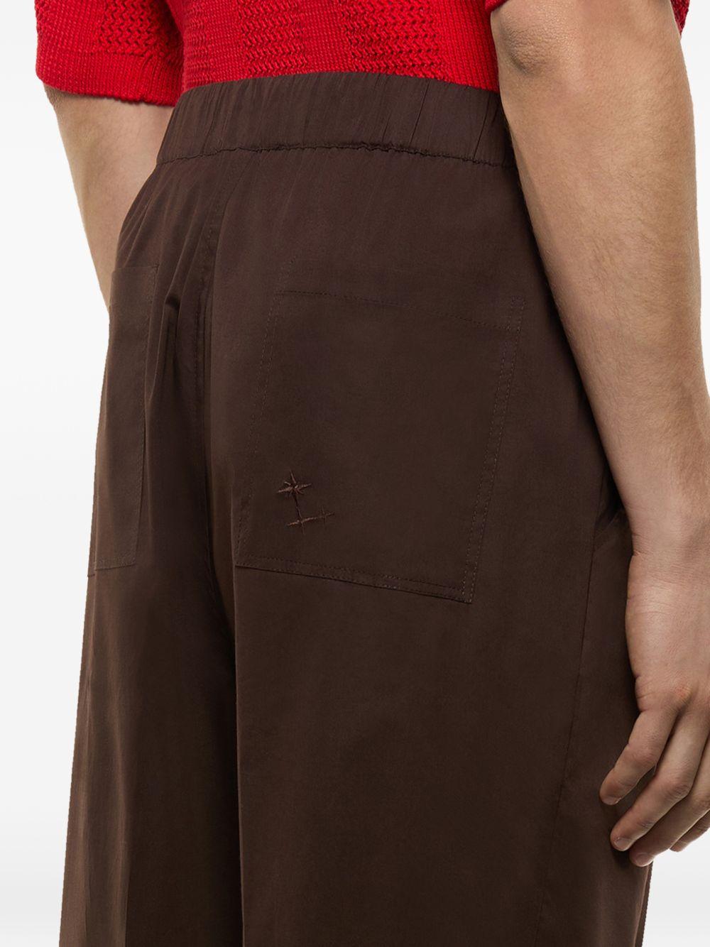 Pantaloni cioccolato con ricamo 