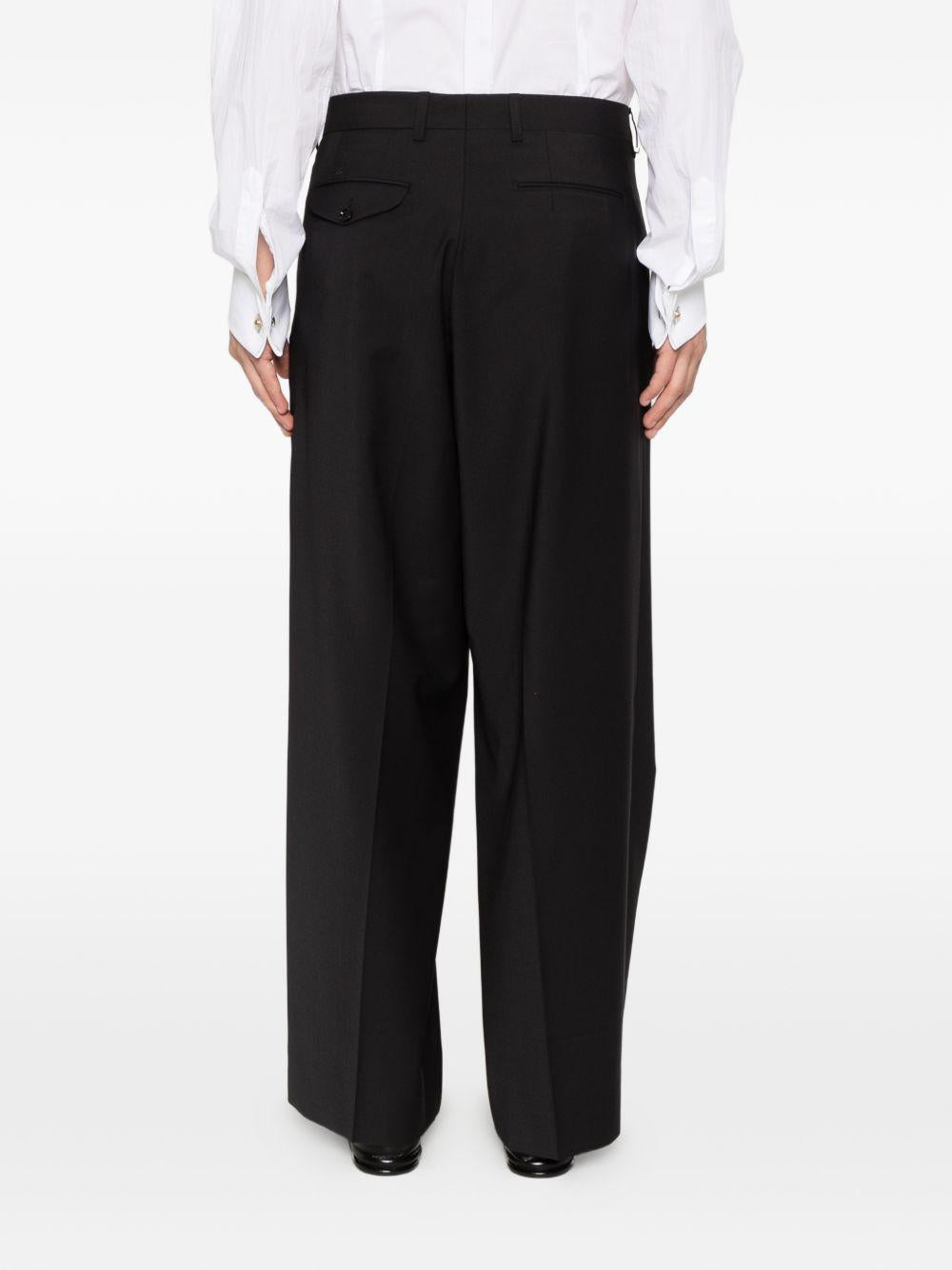 Pantaloni ampi con pinces neri 