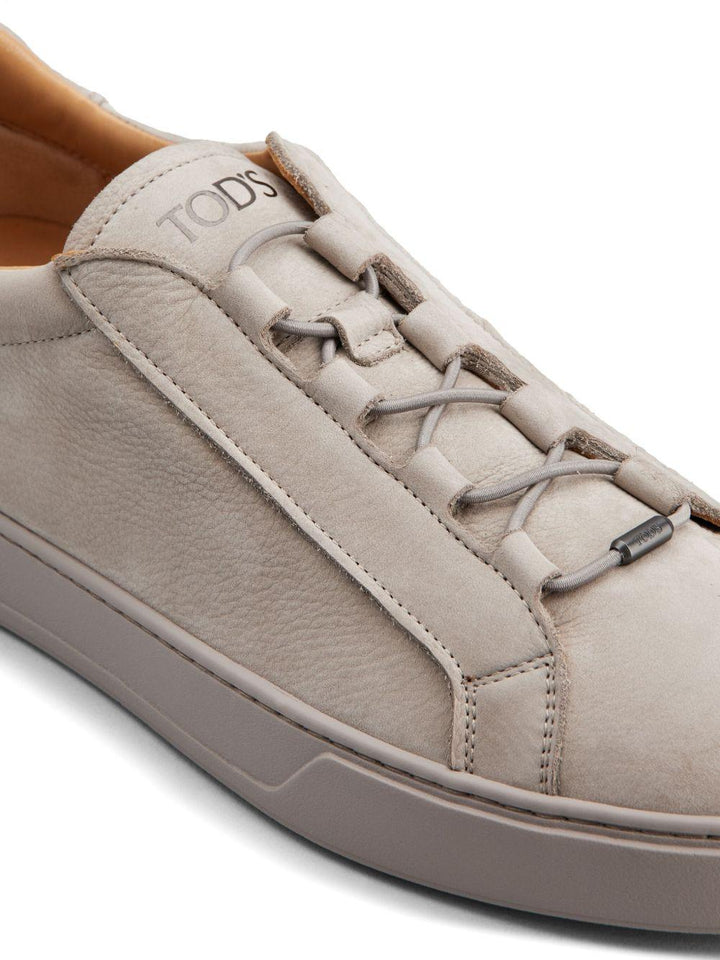 Sneakers grigie in pelle con logo stampato 