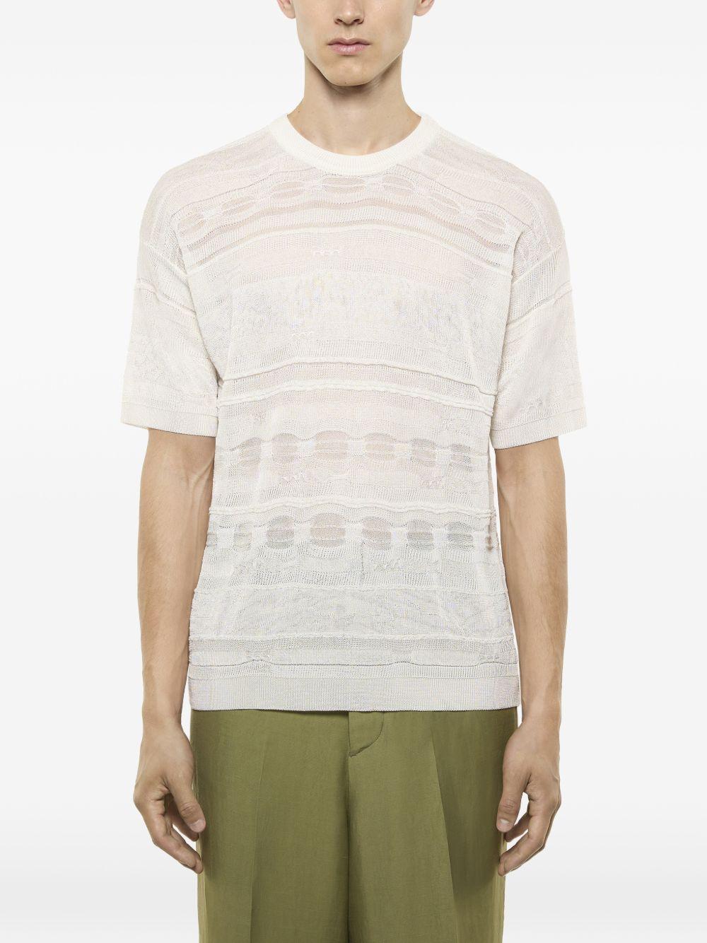 T-shirt panna in maglia con trasparenze 