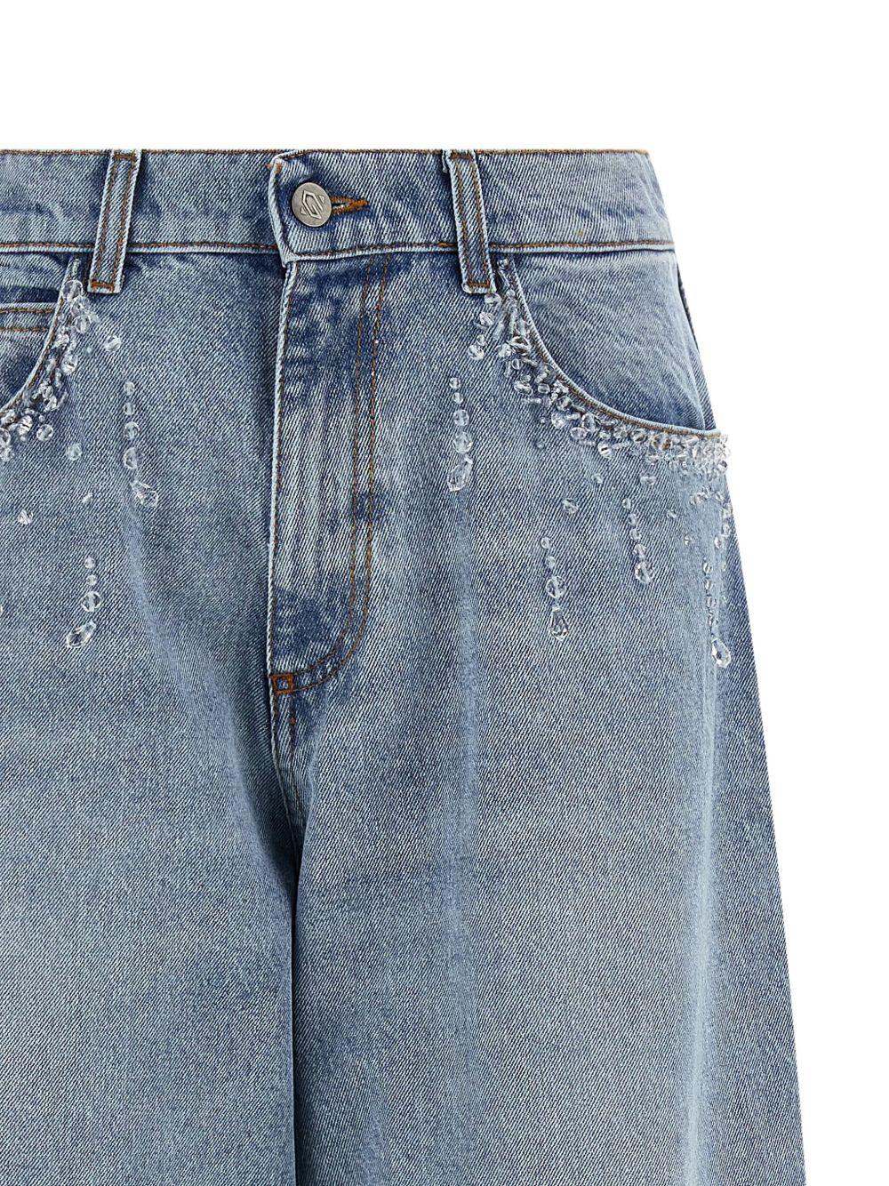 Jeans con applicazioni di cristalli 