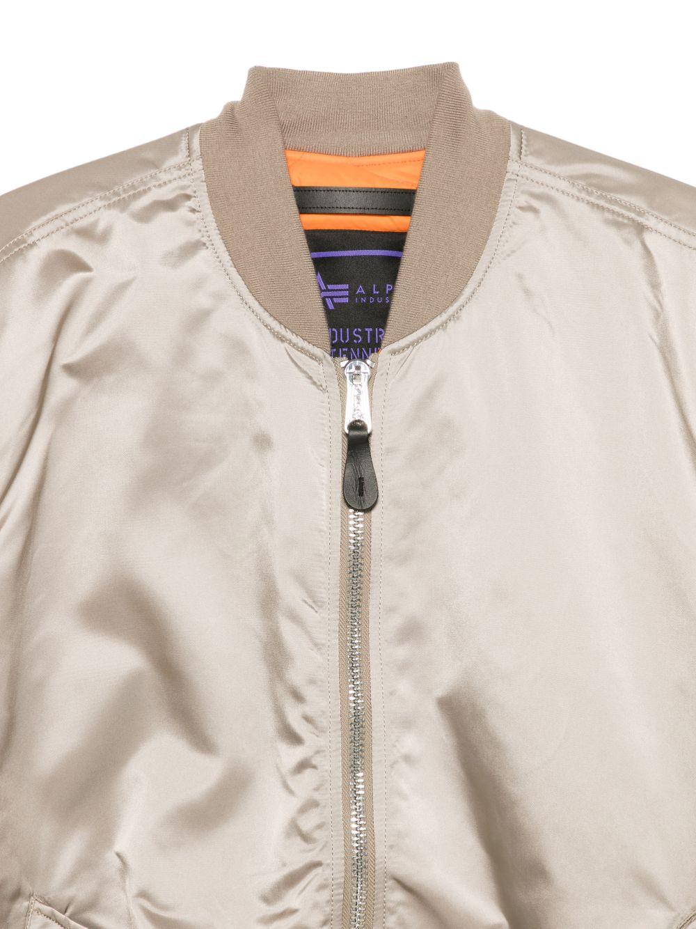 Bomber con zip beige 