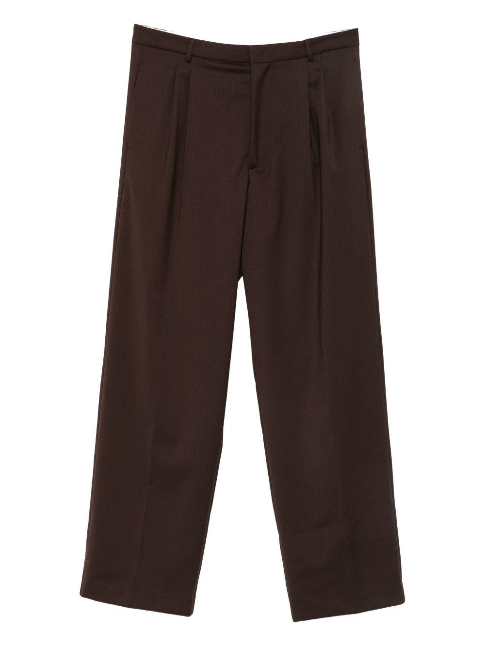 Pantaloni marroni con piega 