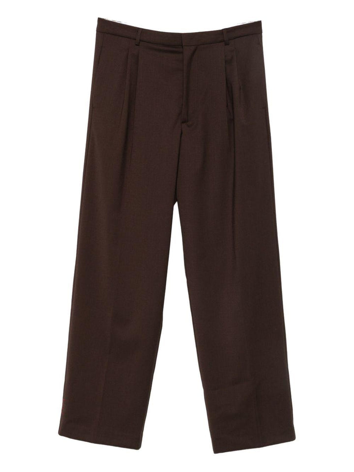 Pantaloni marroni con piega 