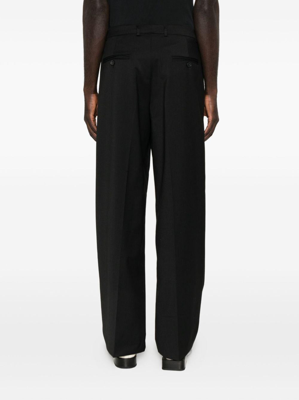 Pantaloni neri con piega 
