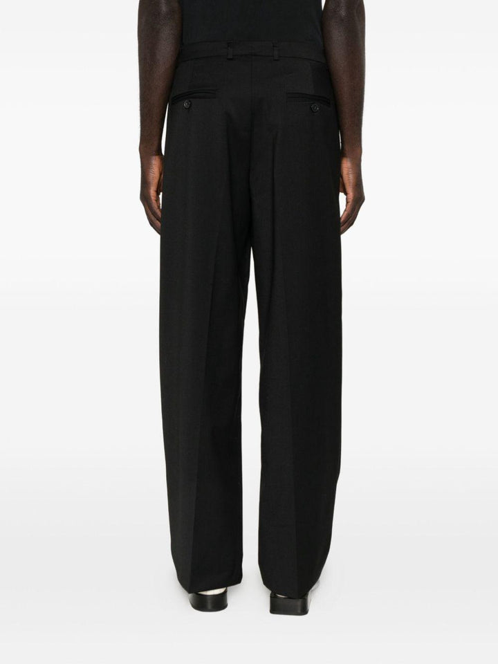 Pantaloni neri con piega 