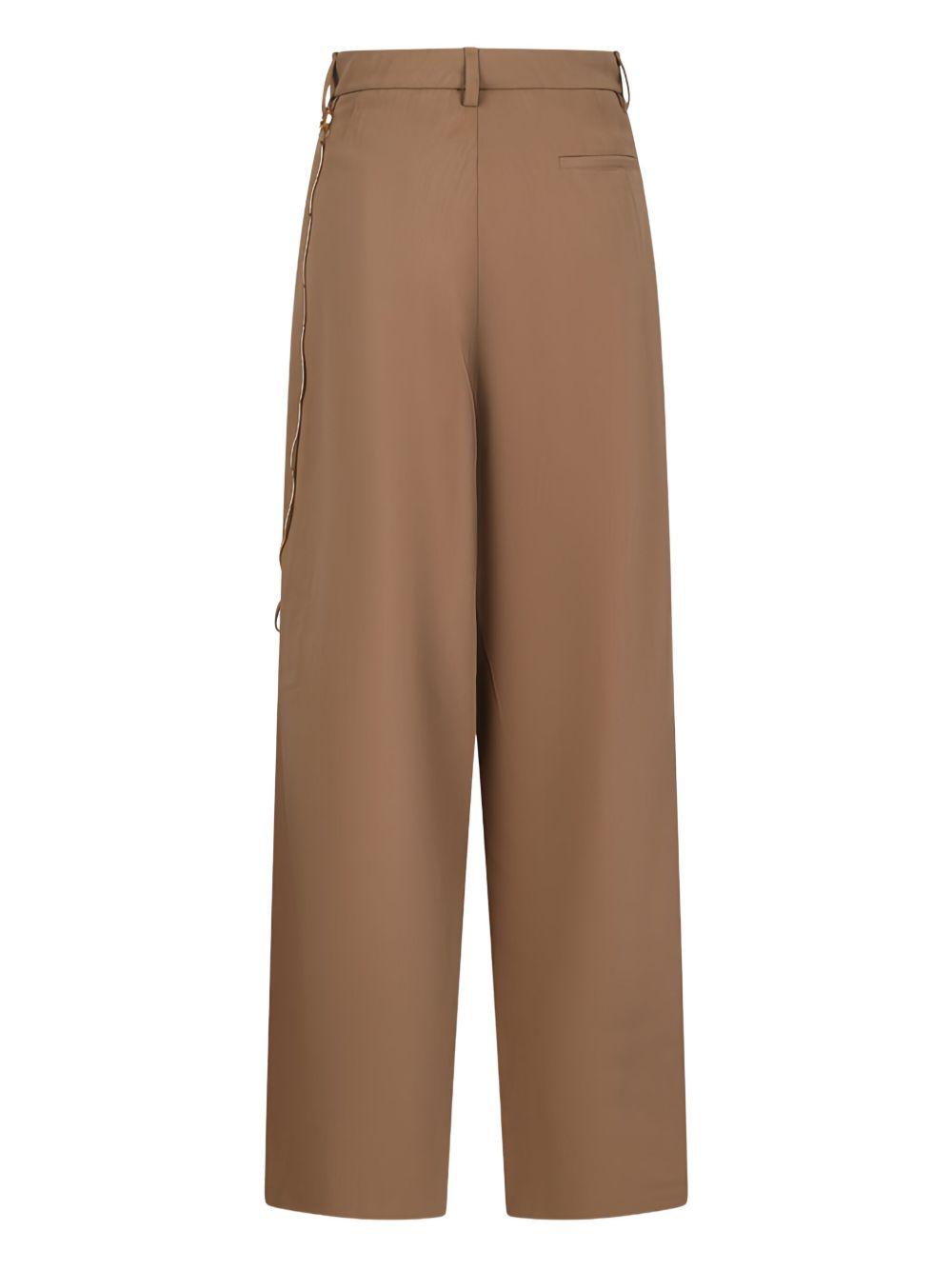 Pantaloni con decorazione 