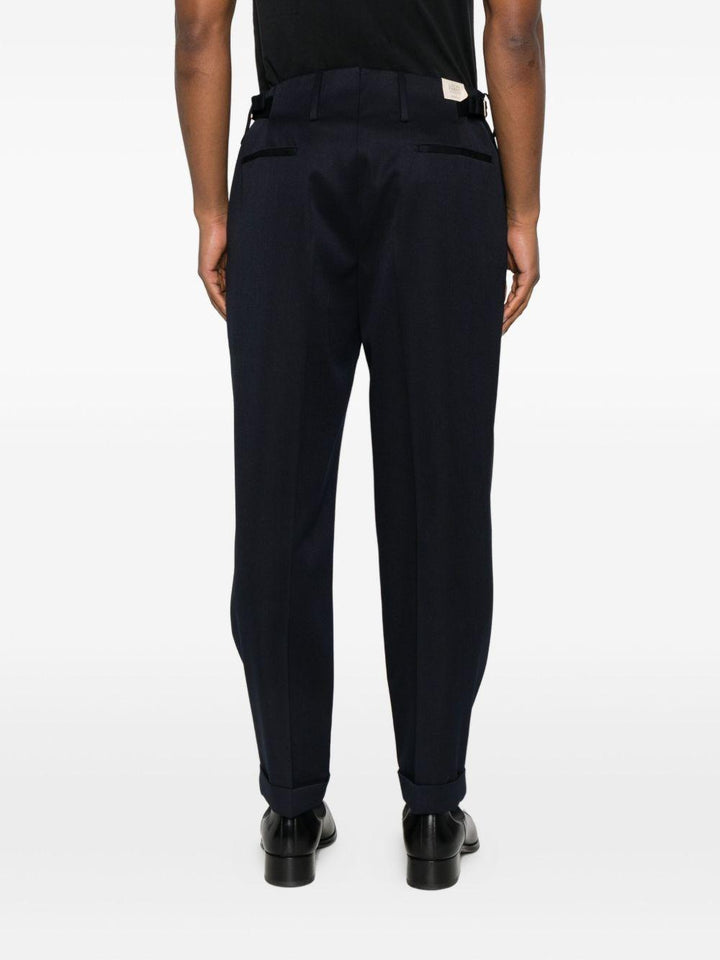 Pantaloni plissé blu navy in lana vergine 