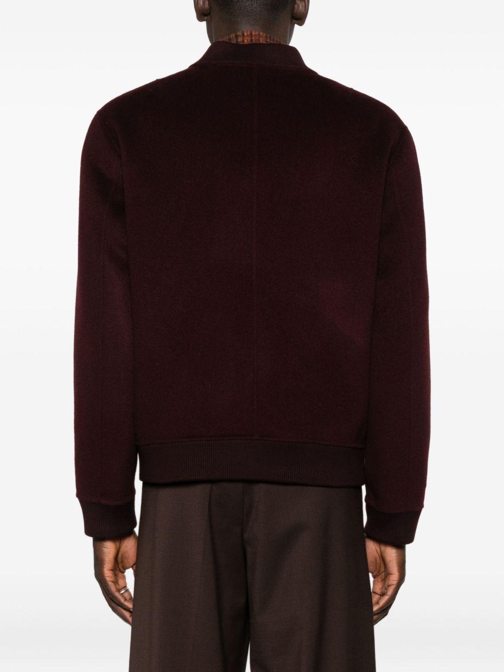 Bomber melanzana con zip 