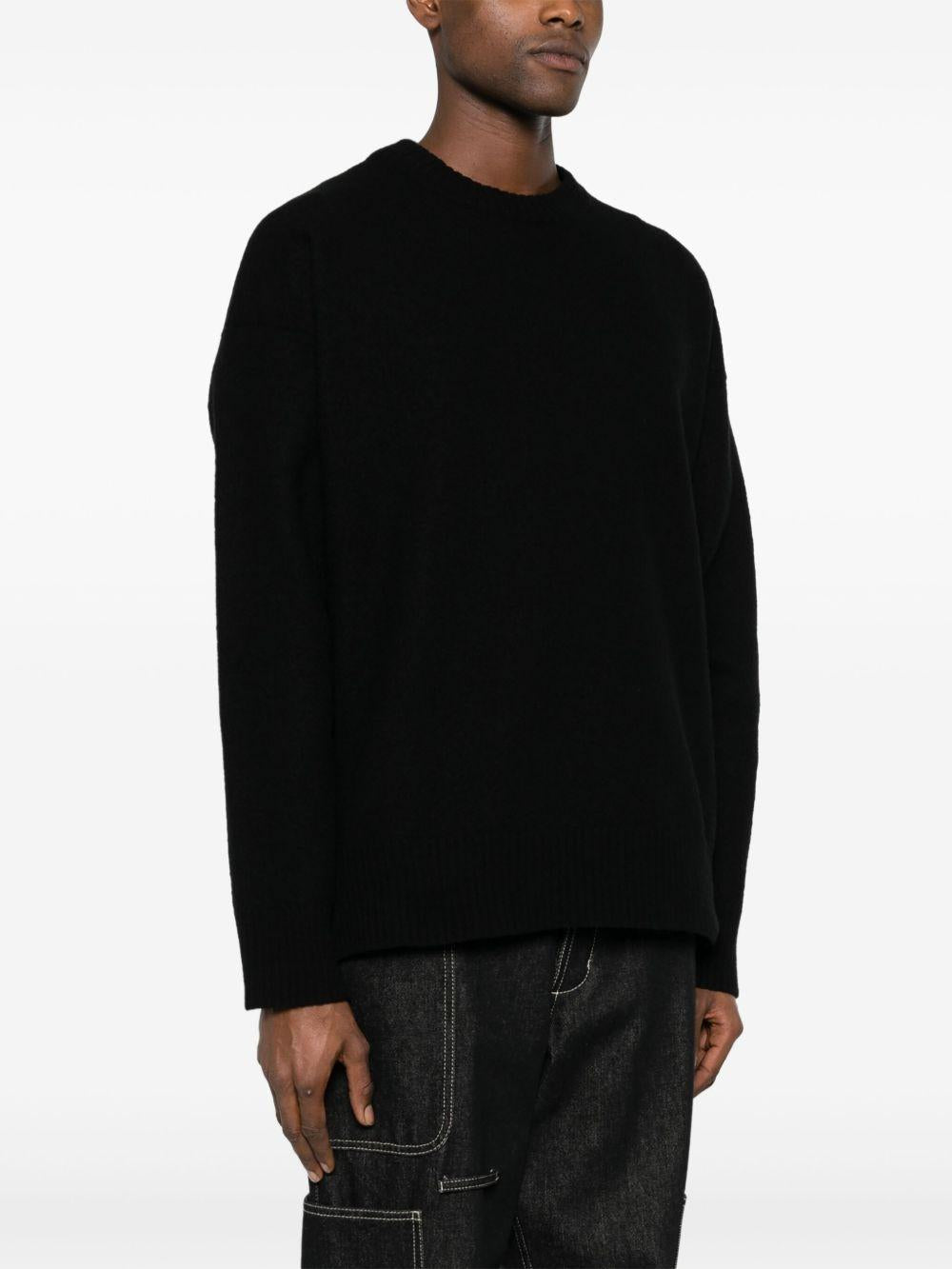 Maglione blu con spacco laterale 