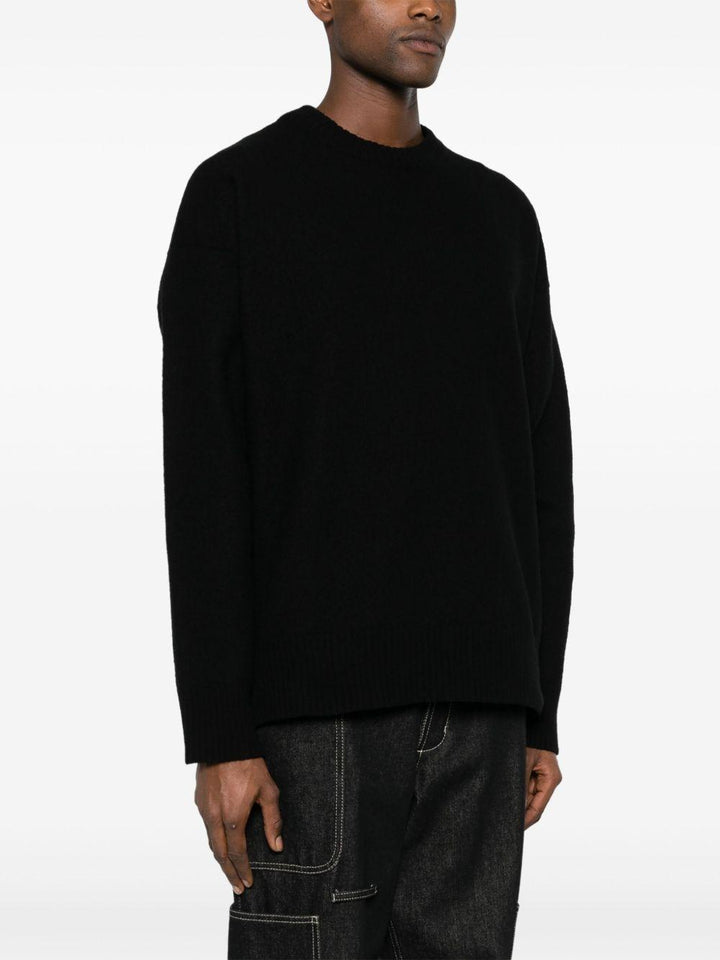 Maglione blu con spacco laterale 