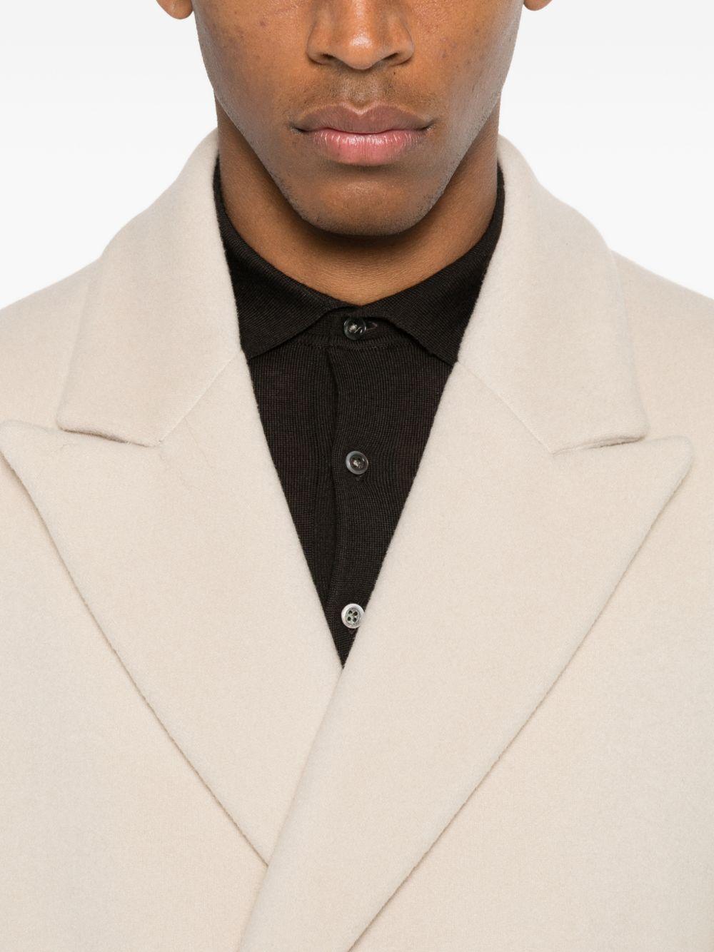 Cappotto doppiopetto color beige 