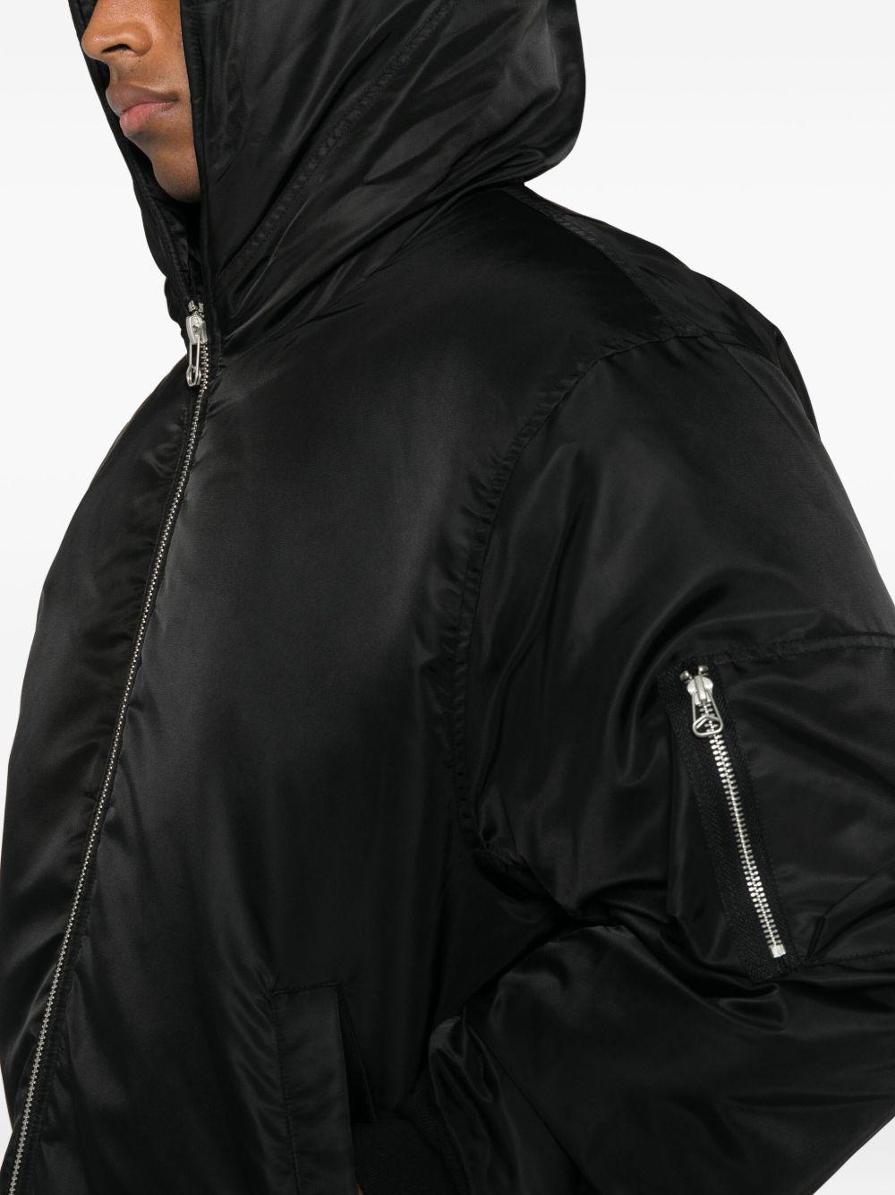 Bomber nero Peacemaker con cappuccio e zip 