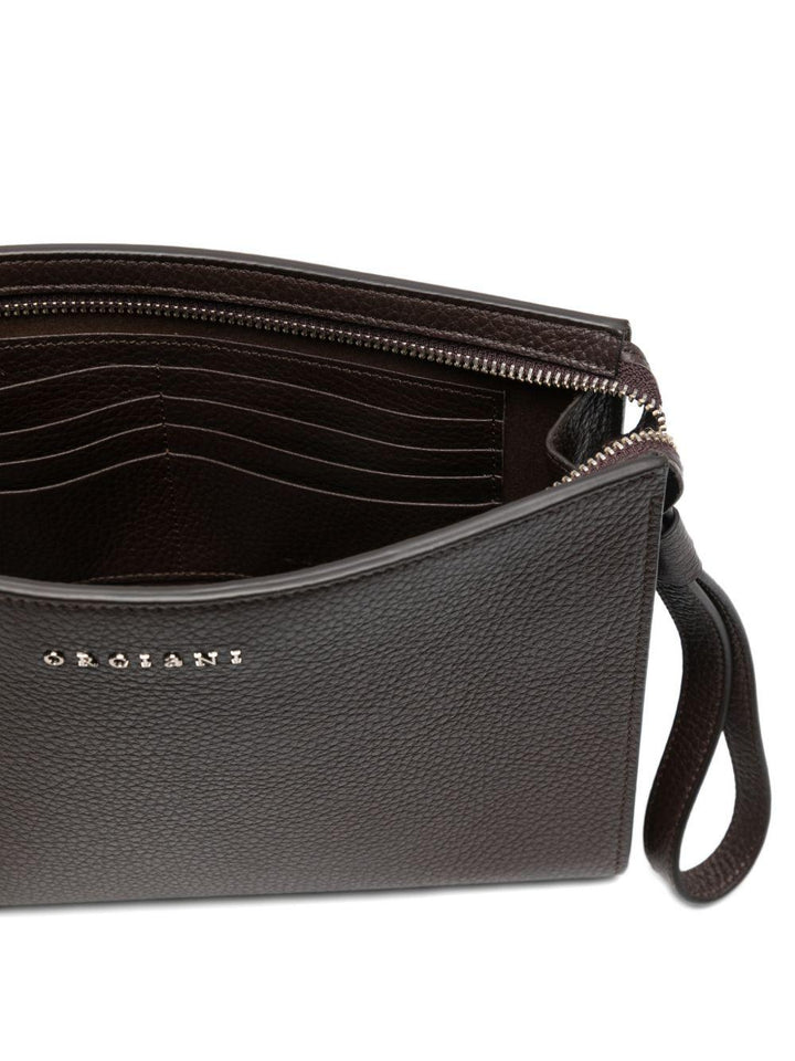 Clutch marrone in pelle 