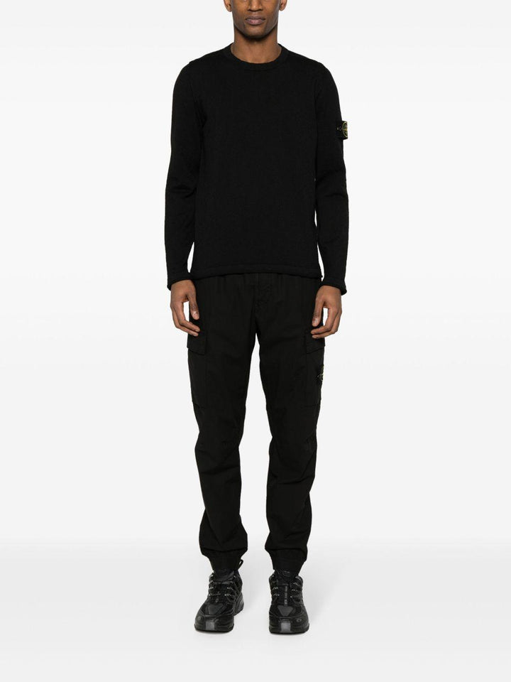 Maglione nero con applicazione 