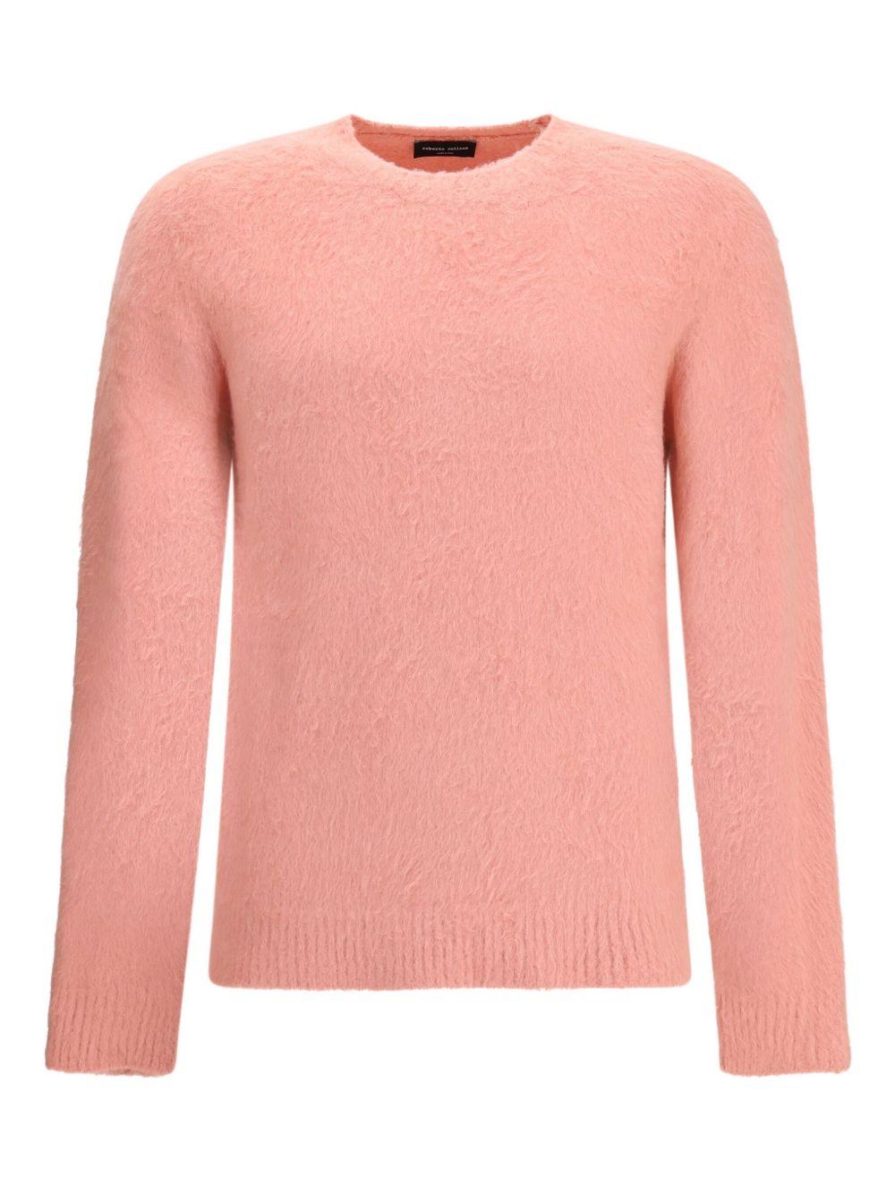 Maglione rosa con finitura morbida 