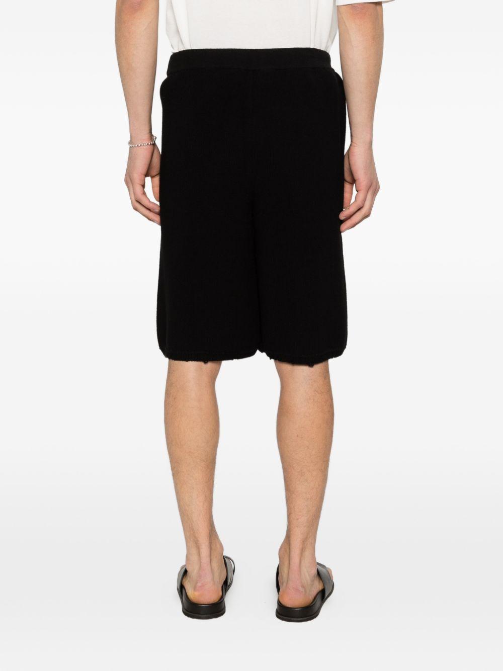 Shorts neroi in maglia con coulisse 