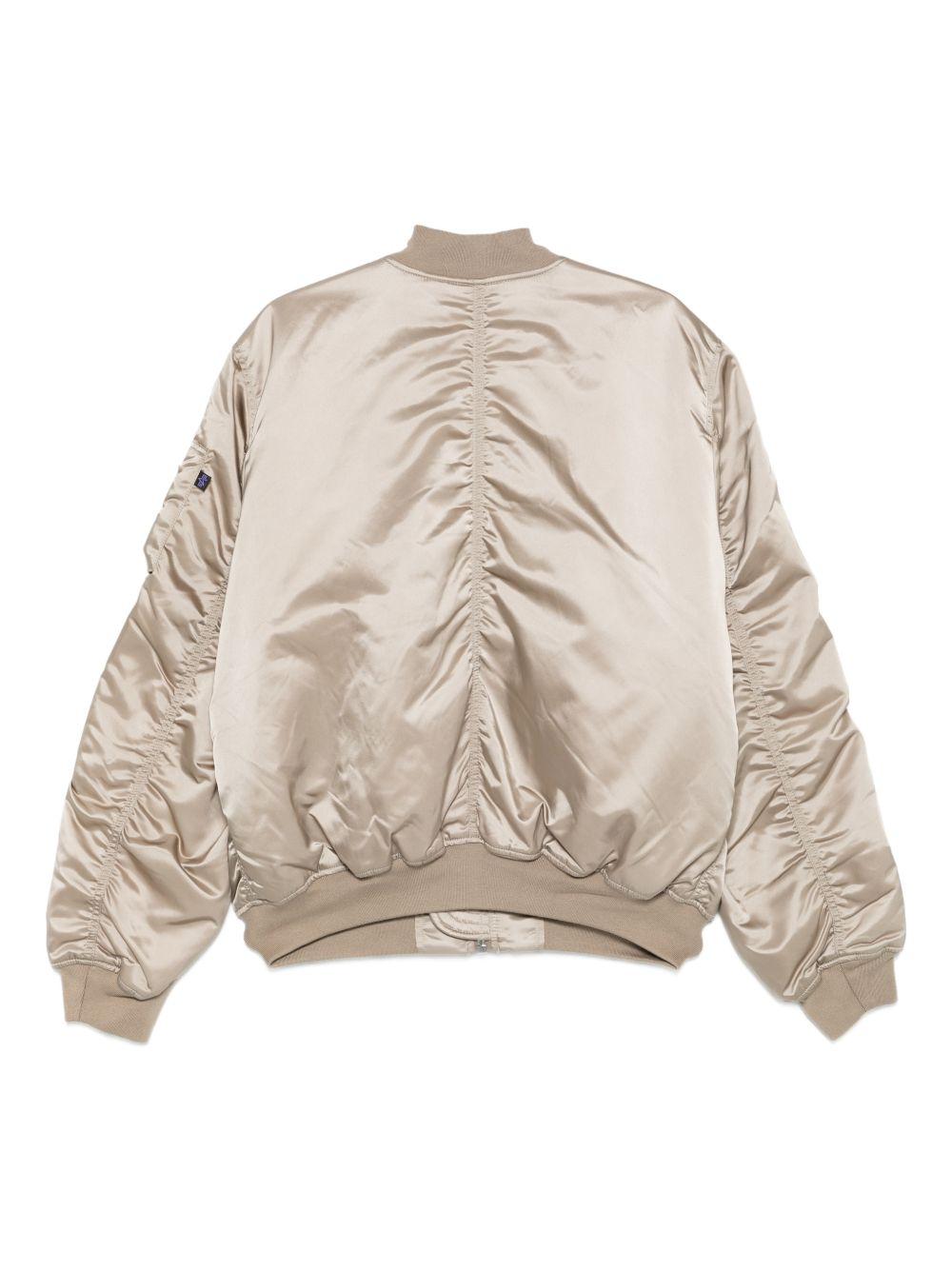 Bomber con zip beige 