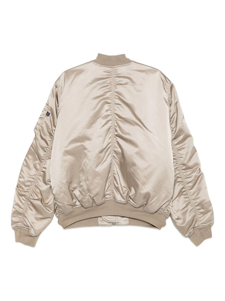 Bomber con zip beige 